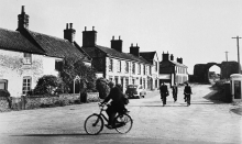 Cyclists at Abbey Street, Bacton.