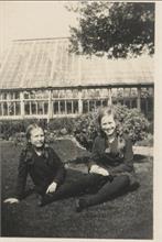 Elizabeth and Barbara Blewitt in front of greenhouse at Aylsham House, North Walsham.