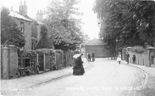 Grammar School Road showing two buskers with violin and harp