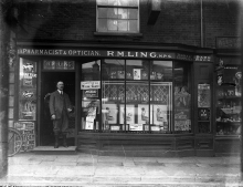 R M Ling(1) at 13 Market Place, North Walsham. The name above the door is now part of the protected frontage.