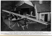 Members of the North Walsham Gliding Club constructing a glider somewhere in North Walsham