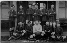 North Walsham 2nd XI football team outside Paston School Pavillion, Norwich Road.
