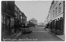 North Walsham Market Place, looking west. Note brick pathway to cross the muddy road.