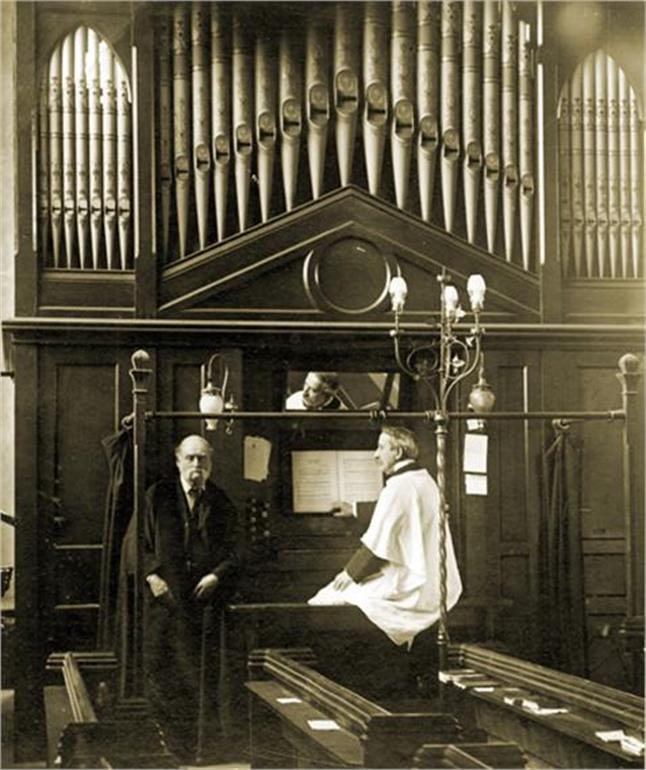 Photograph. 1875 church organ - Mr Dix and Mr Dixon. (North Walsham Archive).