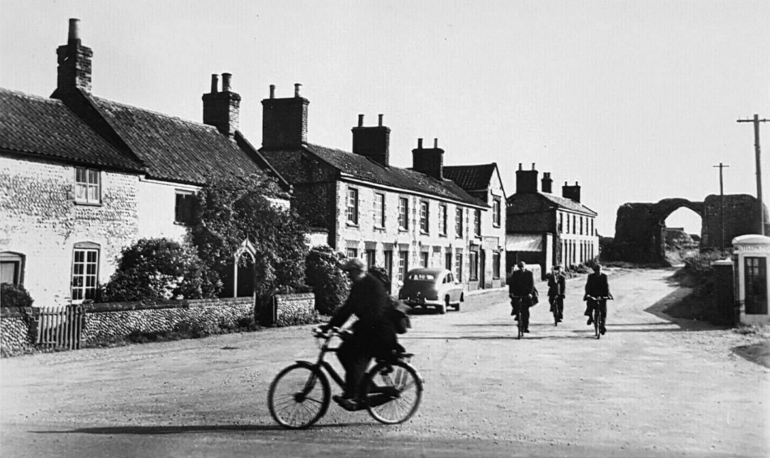 Photograph. Cyclists at Abbey Street, Bacton. (North Walsham Archive).