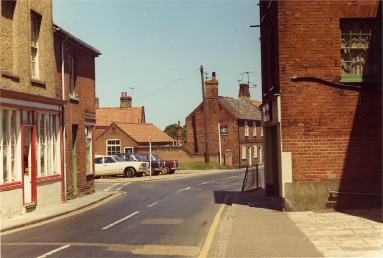 Photograph. Bacton Road viewd from Church Street.1970s. (North Walsham Archive).