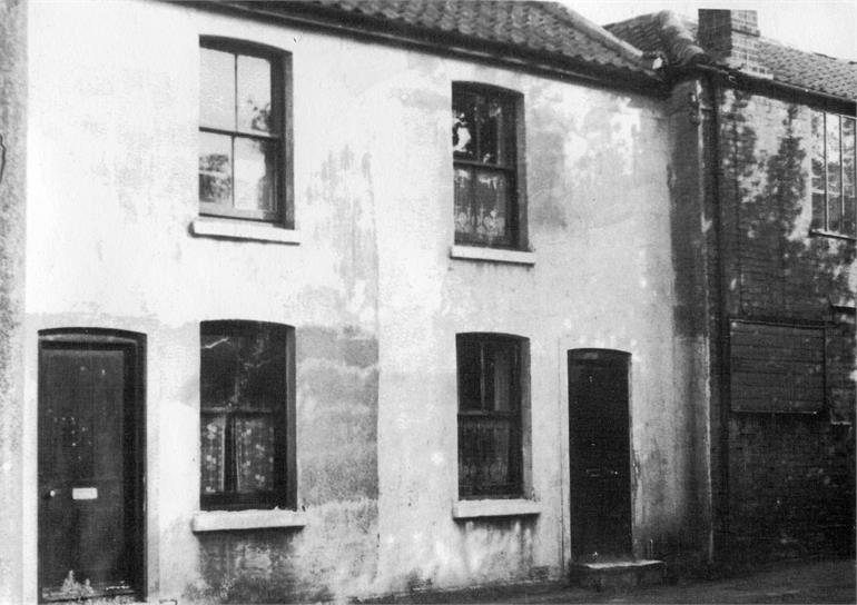 Photograph. Bank Loke Cottages (North Walsham Archive).
