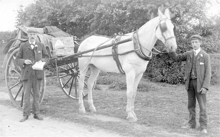 Photograph. Barker's Grocers delivery cart The Butchery, North Walsham. (North Walsham Archive).