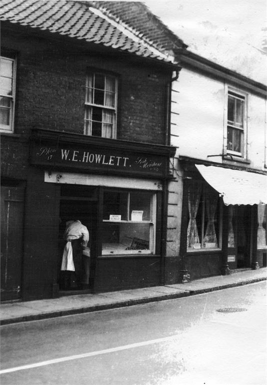 Photograph. Billy Howlett's fish shop on Market Street. (North Walsham Archive).