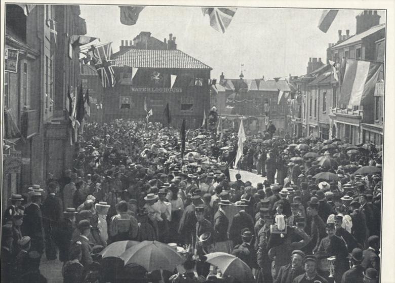 Photograph. Children singing in the Market Place for the Diamond Jubilee 1897. (North Walsham Archive).