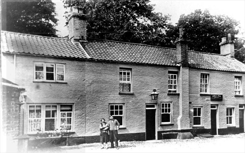 Photograph. The Cock Inn, North Street, North Walsham. (Now the Cockerel Restaurant) (North Walsham Archive).