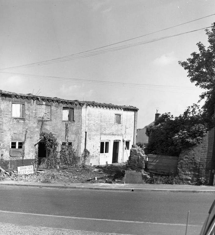 Photograph. Demolition of buildings on corner of Mundesley Road and Vicarage Street (North Walsham Archive).