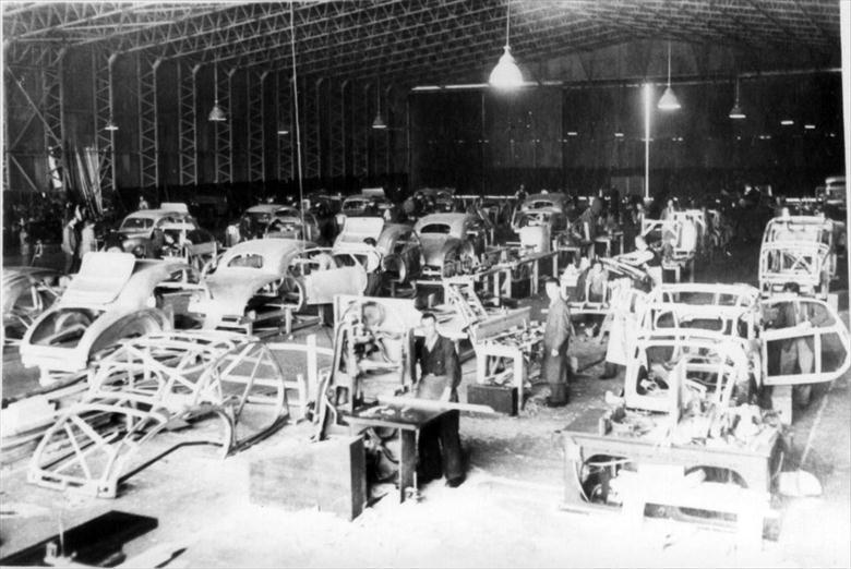 Photograph. Duncan Industries (Engineering) Ltd, Park Hall, New Road, North Walsham. Duncan Alvis assembly line at Swannington Airfield in autumn 1947 (North Walsham Archive).