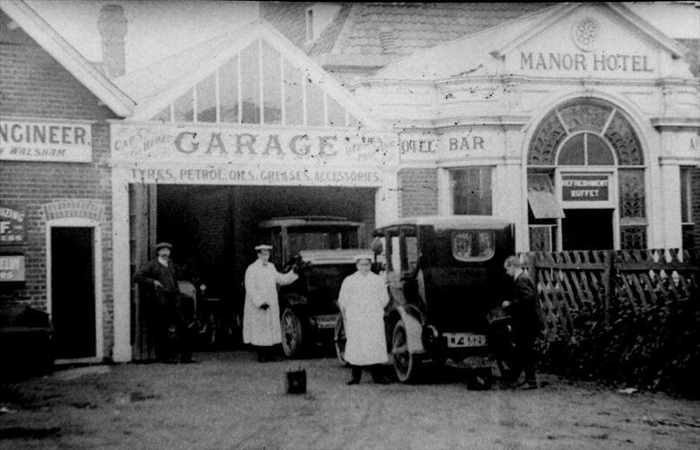 Photograph. Frank Mann's Garage at Mundesley, next to the Manor Hotel. (North Walsham Archive).