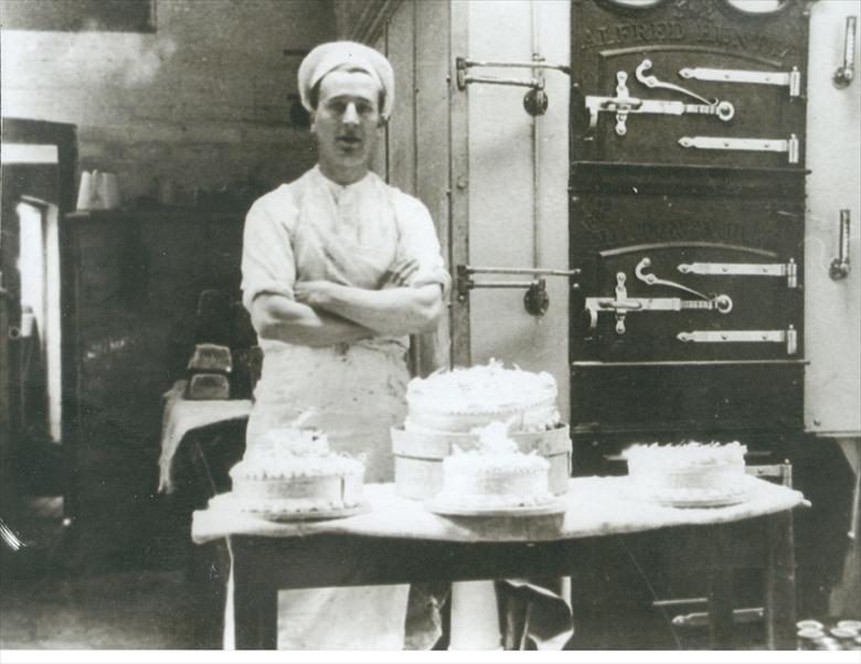 Photograph. Freddie Edwards in the Norwich Road Bakery (North Walsham Archive).