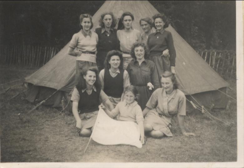 Photograph. Girl Guide Company North Walsham at camp in 1947 (North Walsham Archive).