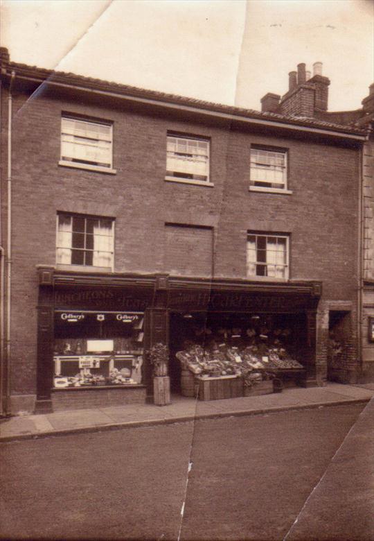 Photograph. H Carpenter, Greengrocer and Cafe Market Place adjacent to Pope's Passage (North Walsham Archive).