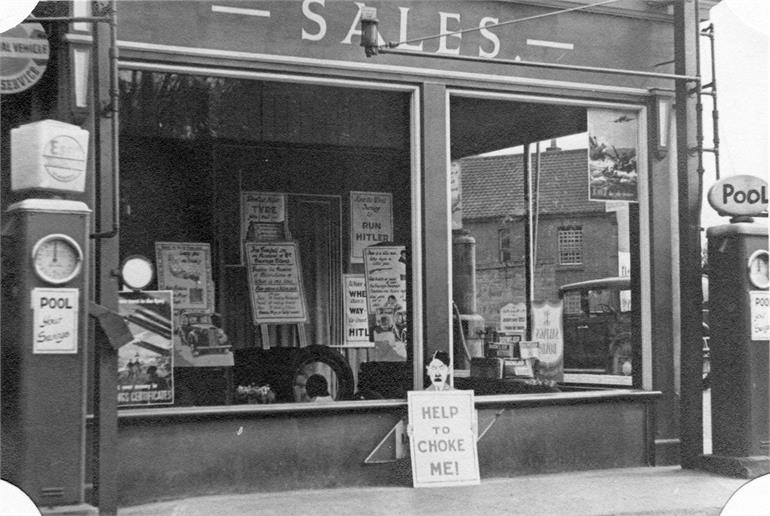 Photograph. Harmer & Scott's Garage on the Norwich Road. (North Walsham Archive).
