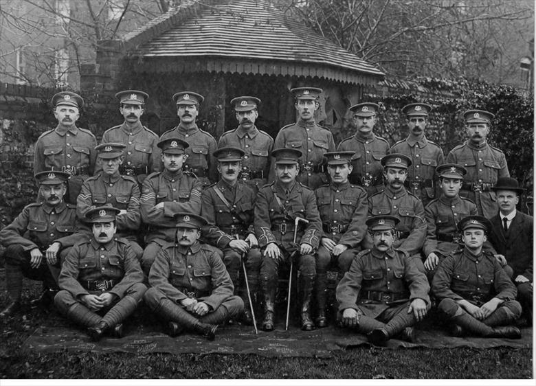 Photograph. "Home Guard", 1918, Tudor House, Grammar School Road, North Walsham. Capt. John Dixon seated centre. (North Walsham Archive).