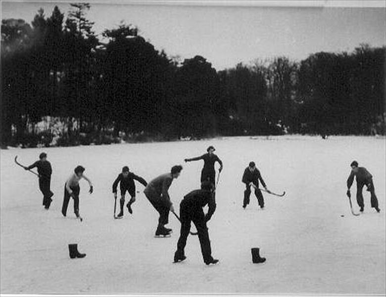 Photograph. Ice hockey on Westwick Pond, near North Walsham. (North Walsham Archive).