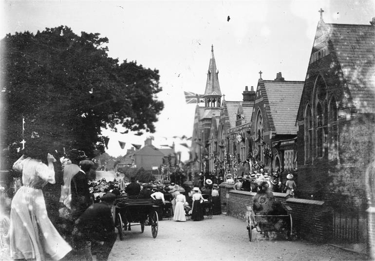 Photograph. The King George V Coronation celebrations 1911 in North Walsham outside Manor Road School. (North Walsham Archive).
