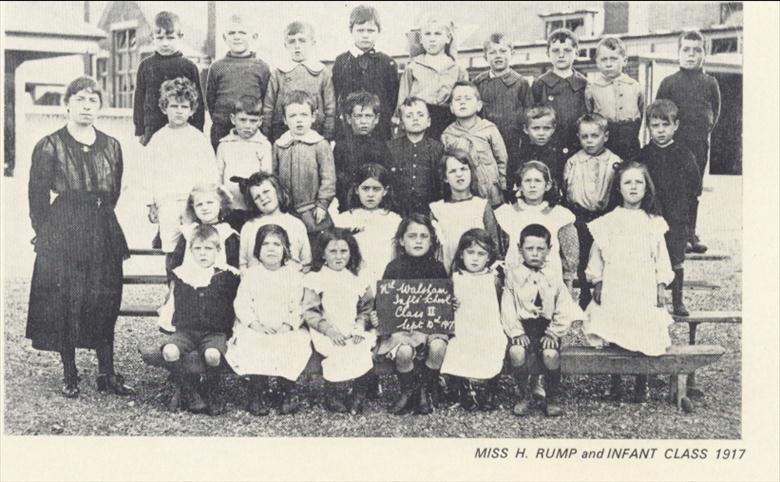 Photograph. Miss H.Rump and Infant class 1917 (North Walsham Archive).