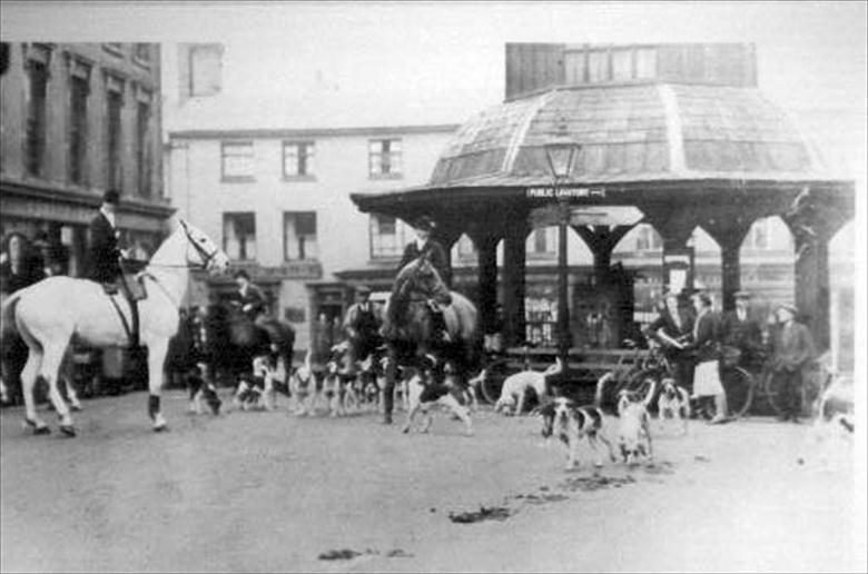 Photograph. North Walsham Hunt meet before the Market Cross (North Walsham Archive).