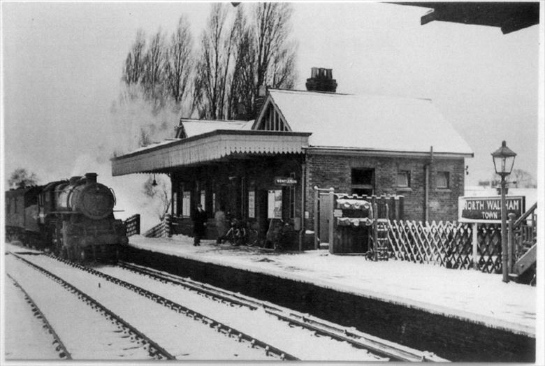 Photograph. North Walsham "Town" Station. The train approaching, engine No. 43158, was bound for the Yarmouth "Beach" Station (North Walsham Archive).