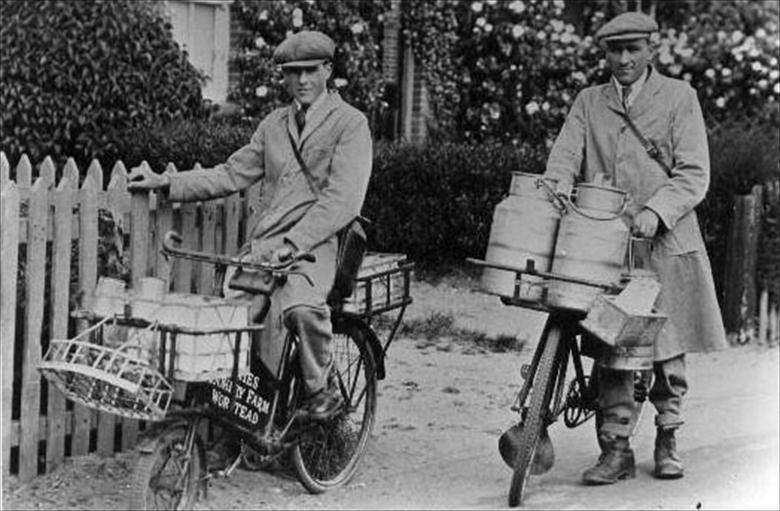 Photograph. Nth.Walsham milkmen.Geoffrey (Freddie) Jarvis, later of fish shop & Stanley Scott, later own Milk Business on Station Road, in early days. (North Walsham Archive).