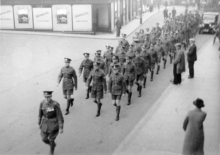 Photograph. Paston Cadets in North Walsham Market Place c1930. Major Pickford leading. (North Walsham Archive).