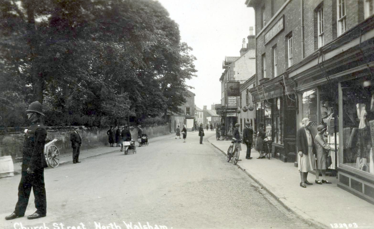 Photograph. Policeman on Church Street in 1930s (North Walsham Archive).