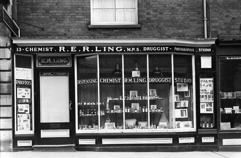 Photograph. R. E. R. Ling, chemist, North Walsham Market Place. 1947. (North Walsham Archive).