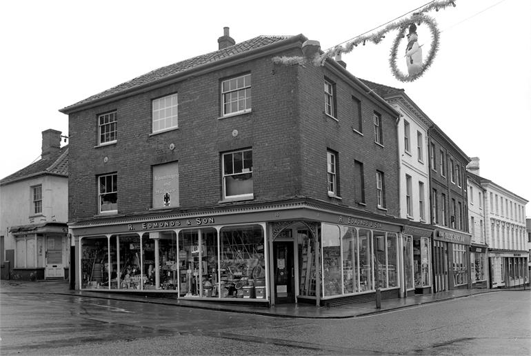 Photograph. R. Edmond & Son, North Walsham Market Place at Christmas time in. (North Walsham Archive).