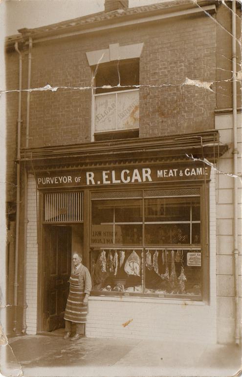 Photograph. R Elgar butcher in North Walsham Market Place (North Walsham Archive).