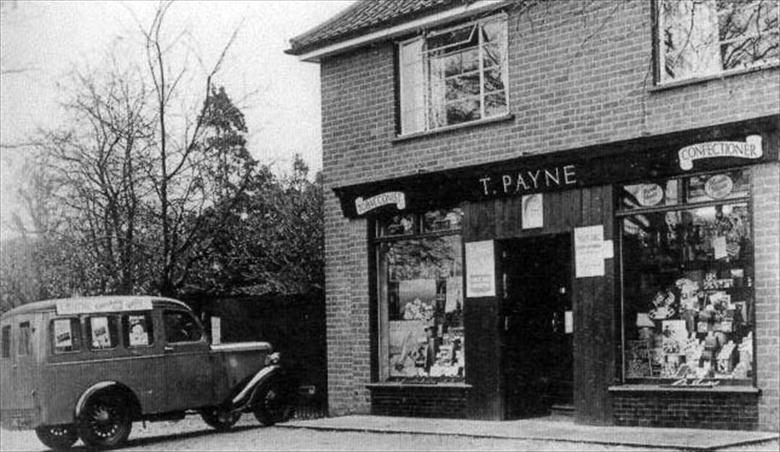 Photograph. Thomas Payne's Confectioner & tobacconist shop on New Road. Dennis Payne's Jowett van in front (North Walsham Archive).