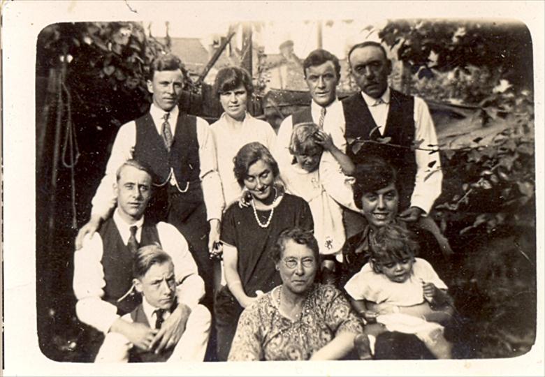 Photograph. Top: Joseph Shaw,Aunt Queenie,Uncle Earnest,Grampa Shaw. Middle: Uncle Bert,Auntie Elsie, Eileen Shaw. Bottom: Uncle Fred, Grandma Shaw, Elsie Shaw. (North Walsham Archive).