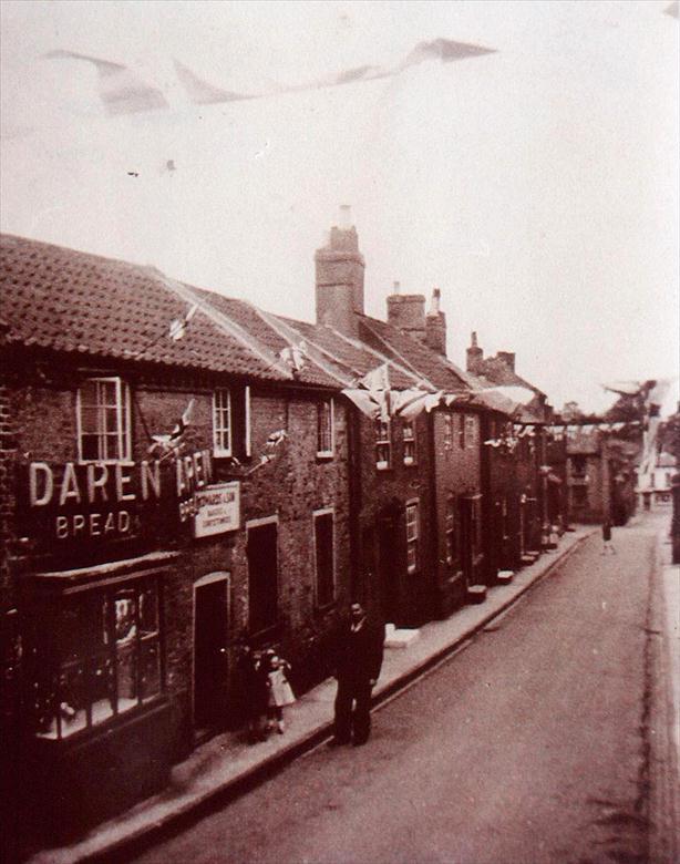 Photograph. Vicarage Street, North Walsham, showing baker's shop (North Walsham Archive).