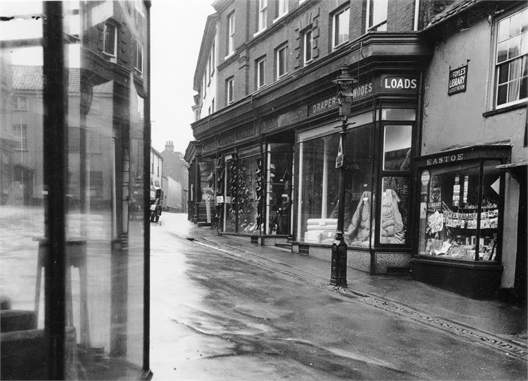 Photograph. A view up Kings Arms Street from Market Street in North Walsham. (North Walsham Archive).