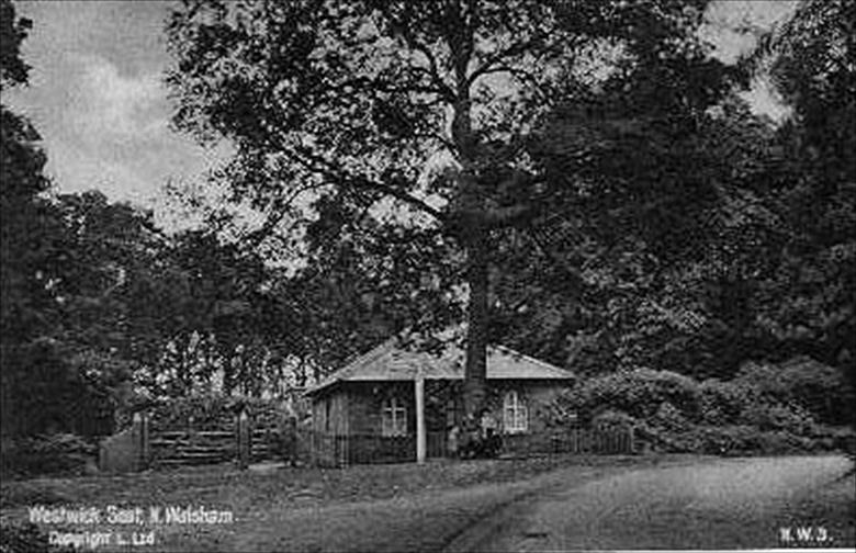 Photograph. Westwick Seat on Norwich Road in Westwick Woods at junction to Swanton Abbot. (North Walsham Archive).