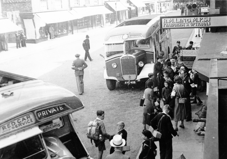 Photograph. WWII Evacuees in North Walsham Market Place (North Walsham Archive).